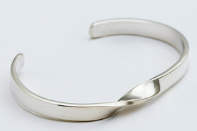 Sterling silver handmade open cuff bangle with twist