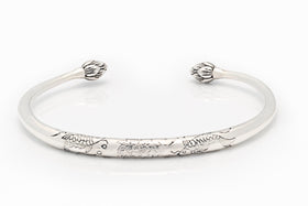 Silver bangle - engraved torc design with lotus flower ends