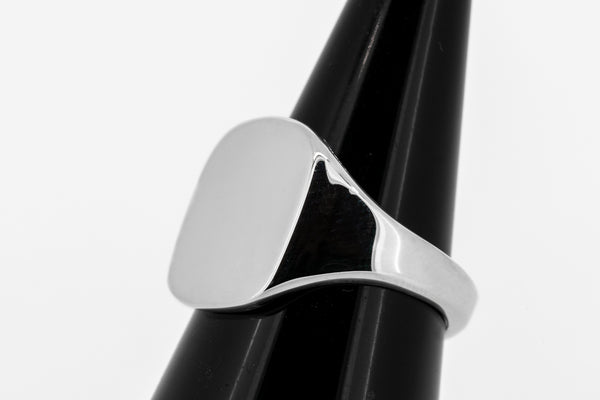 Signet ring cushion-head shape in sterling silver.